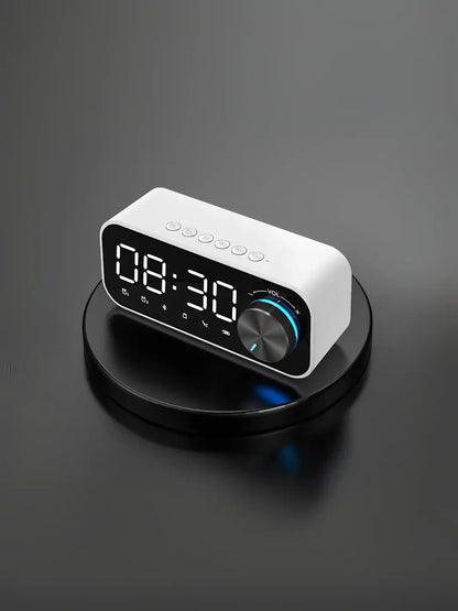 Radio réveil blanc design posé sur un socle