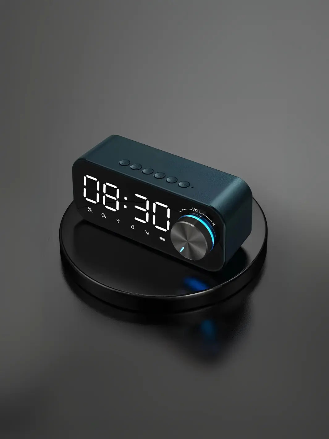 Radio réveil vert design posé sur un socle